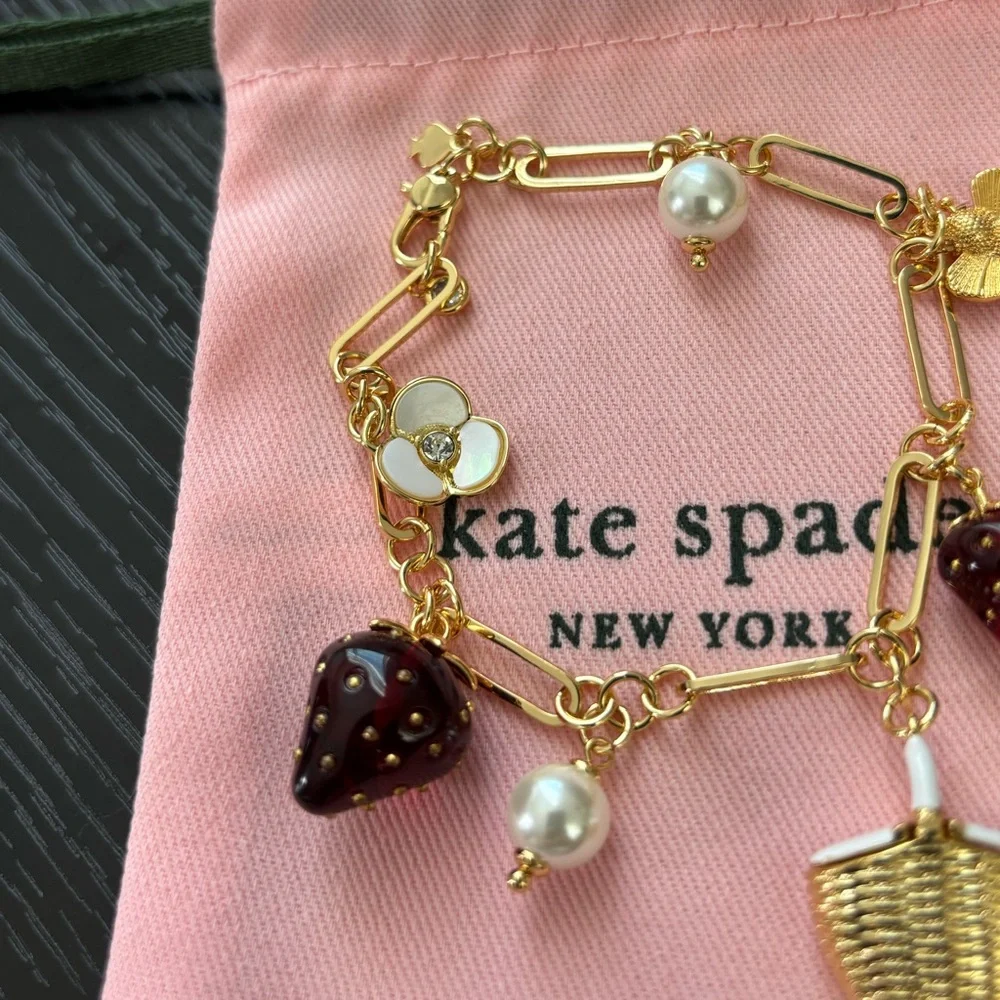 NWOT Kate  spade Gold Charm Bracelet with Burgundy Strawberry & Pearl Accents - Picture 2 of 6